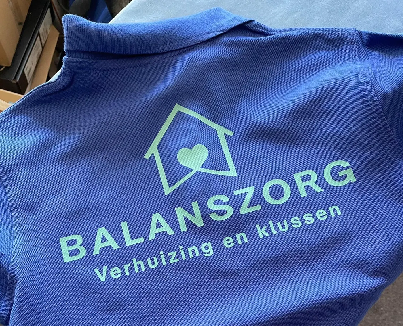 Bedrukte bedrijfspolo van Balanszorg